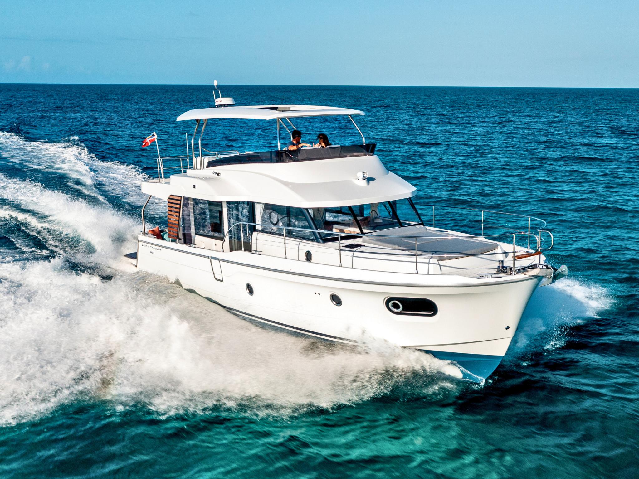Beneteau Swift Trawler 48 2026 Beneteau Swift Trawler 48 cruising on open sea, showcasing sleek design and performance.
