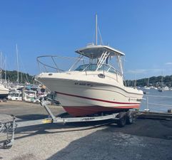 Striper 200 Walkaround 2018 Striper 200 Walkaround boat on trailer at marina, clear sky background.
