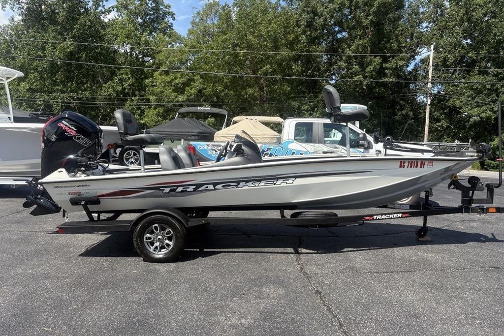 Tracker Pro Team 190 TX 2026 Tracker Pro Team 190 TX boat on trailer, parked outdoors.