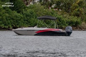 Starcraft SVX 211 OB 2022 Starcraft SVX 211 OB boat on water with Yamaha outboard motor.