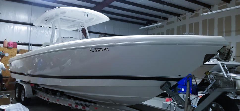 Intrepid 327 Center Console 2016 Intrepid 327 Center Console boat on trailer in storage facility.