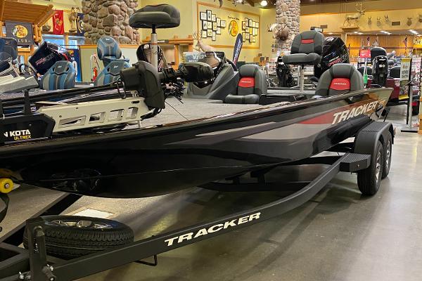 Tracker Savage 215 2025 Tracker Savage 215 boat displayed indoors on a trailer.