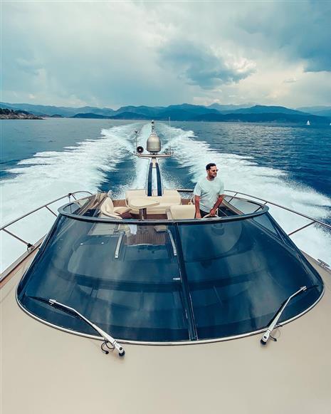Riva 52' le 2011 Riva 52' LE yacht cruising on open water with a person at the helm.