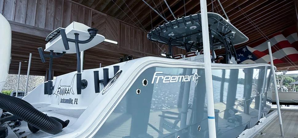 Freeman 42 LR 2019 Freeman 42 LR boat docked under a wooden canopy, Jacksonville, FL.