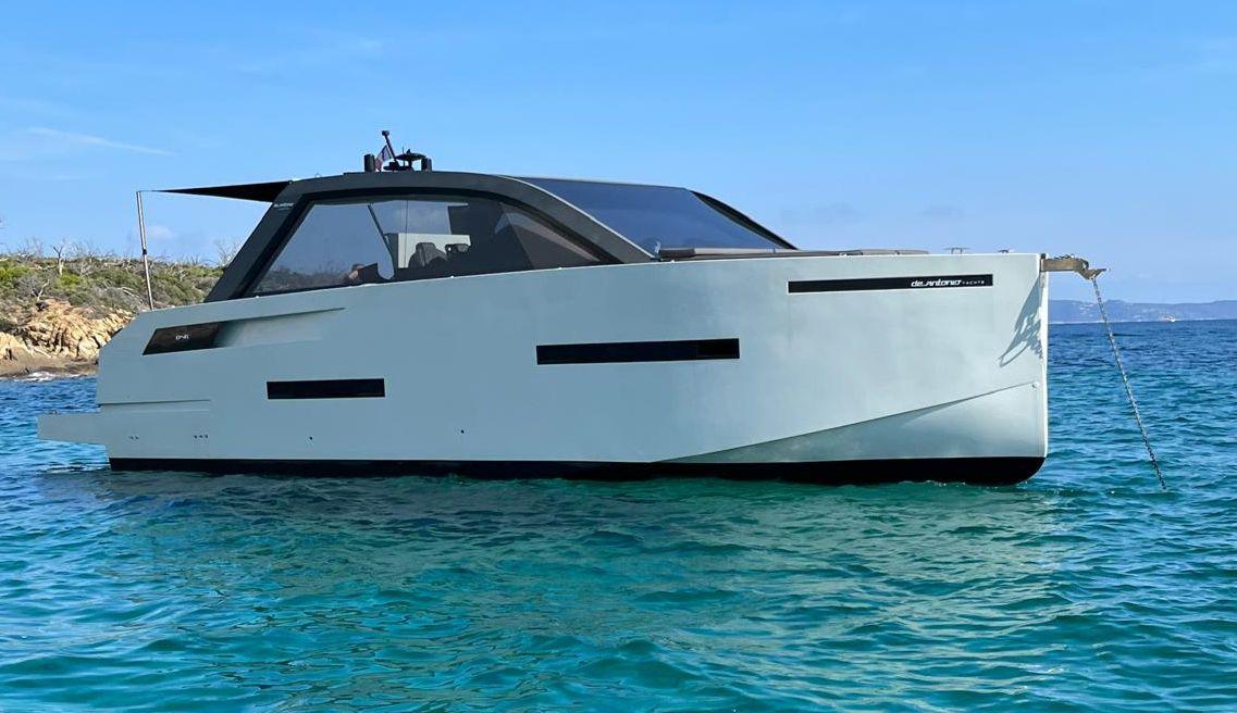 De Antonio Yachts D46 Cruiser 2020 De Antonio Yachts D46 Cruiser on clear blue water, side view.
