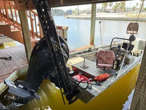 Bass Tracker Grizzly 1648 SC 2014 Bass Tracker Grizzly 1648 SC boat docked, featuring Mercury outboard motor.