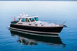 Sabre 48 Salon Express 2019 Sabre 48 Salon Express yacht cruising on calm blue waters.