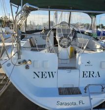 Beneteau 361 Beneteau 361 sailboat, year 2000, docked in Sarasota, FL, with "New Era" name on stern.