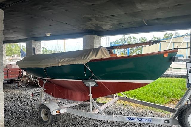 Cape Cod Herreshoff H-12 1/2 2006 Herreshoff H-12 1/2 sailboat by Cape Cod Shipbuilding Co. on a trailer.