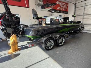 Nitro Z21 XL Pro 2025 Nitro Z21 XL Pro boat in showroom, featuring sleek design and dual-axle trailer.