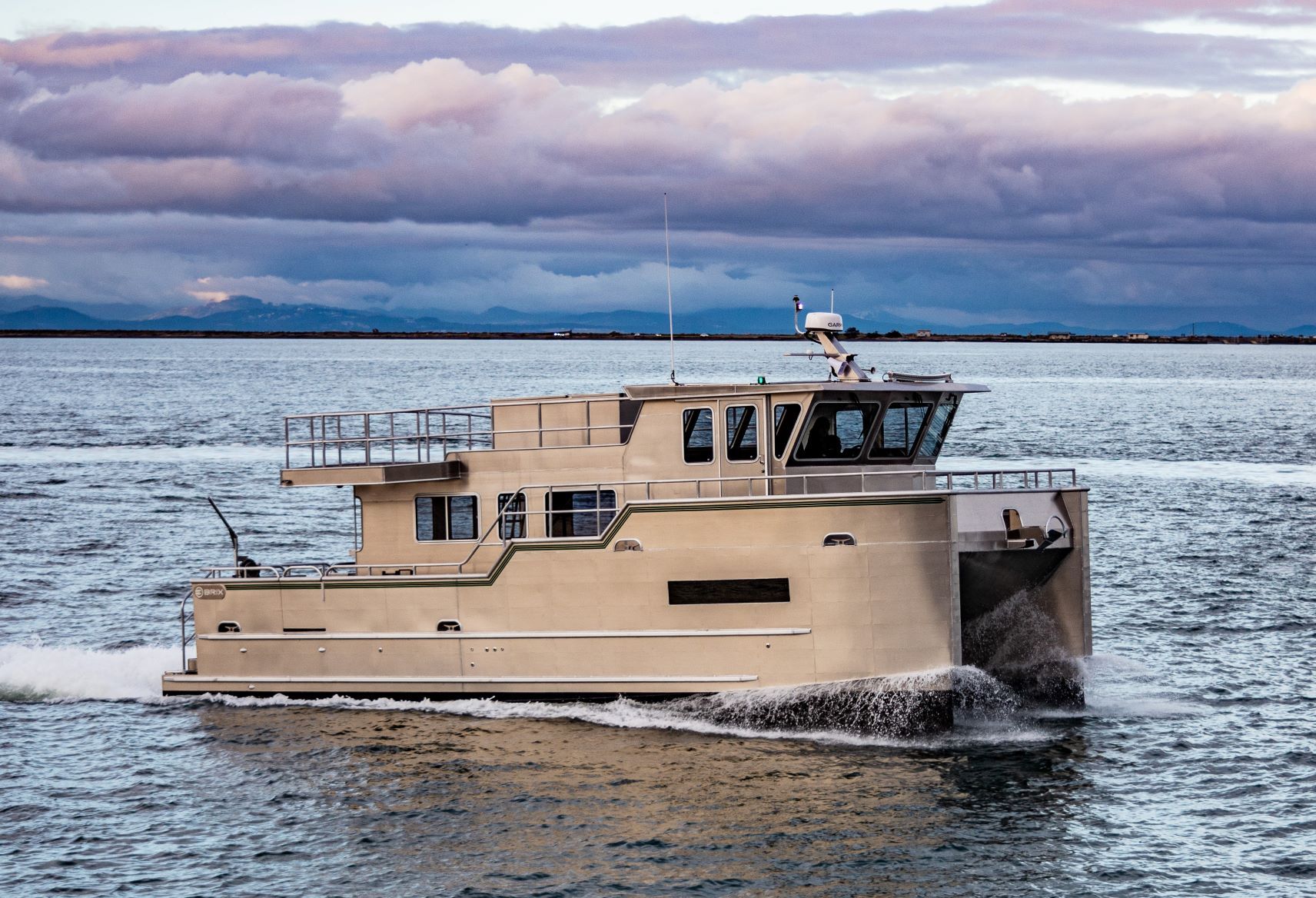Aluminum Cruiser 42' Aluminum Trawler 2020 Aluminum Cruiser 42' Trawler navigating calm waters under cloudy skies.