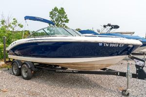Chaparral 21 H2O Ski & Fish 2014 Chaparral 21 Ski & Fish H2O boat on trailer, blue and white design.