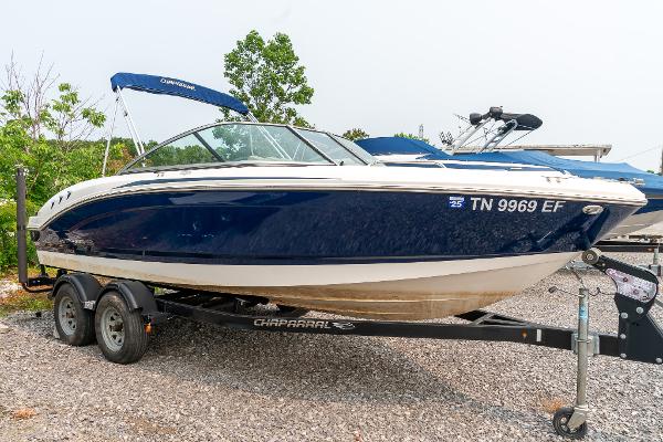 Chaparral 21 Ski & Fish H2O 2014 Chaparral 21 Ski & Fish H2O boat on trailer, blue and white design.