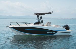 Quicksilver 705 open 2025 Quicksilver 705 Open boat on calm water, featuring sleek design and modern amenities.