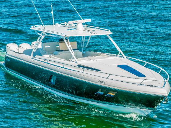 Intrepid 400 Cuddy 2016 Intrepid 400 Cuddy boat cruising on blue water.