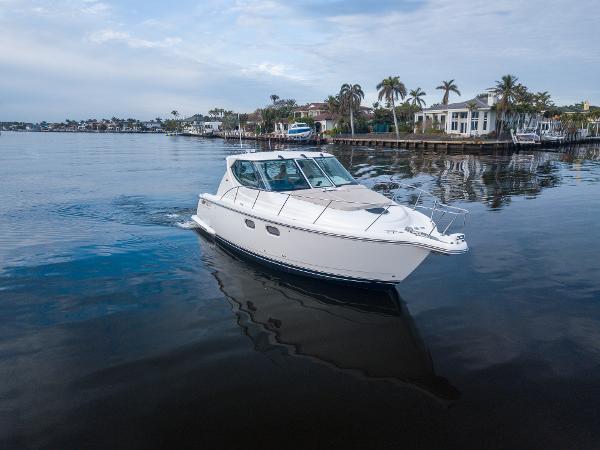 Tiara Yachts 3900 Sovran 2008 Tiara Yachts 3900 Sovran cruising on calm waters near waterfront homes.