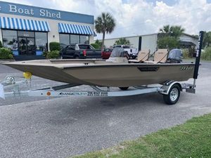 SeaArk Shadow 17 Side Console 2025 SeaArk Shadow 17 Side Console boat on trailer outside dealership.
