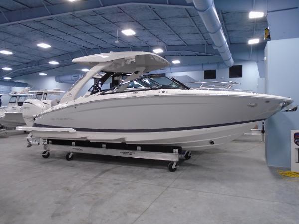 Regal LX9 2024 Regal LX9 boat displayed indoors, showcasing sleek design and modern features.