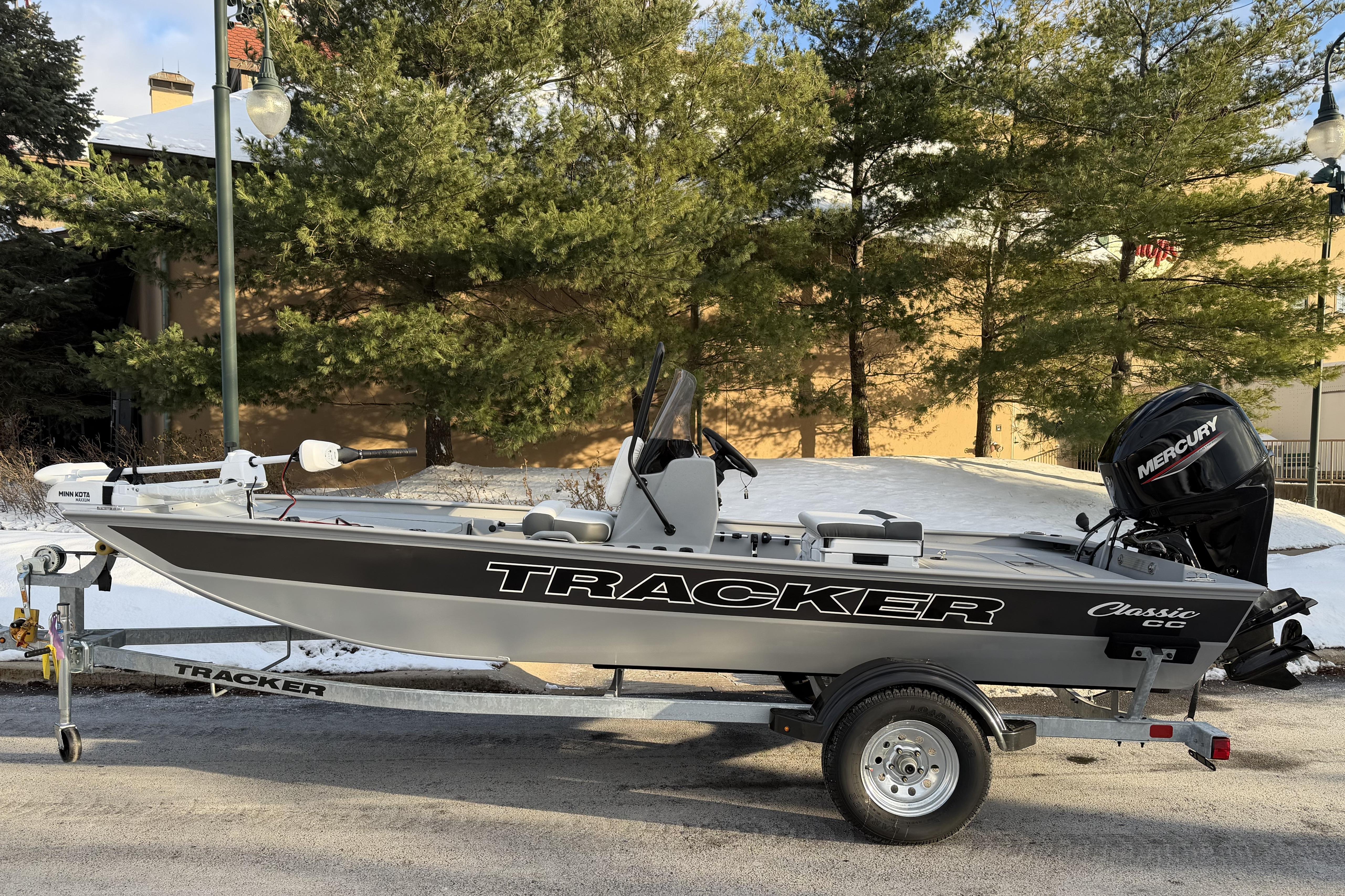 Tracker Bass Tracker Classic CC 2026 Tracker Bass Tracker Classic CC boat on trailer, parked outdoors in snowy setting.