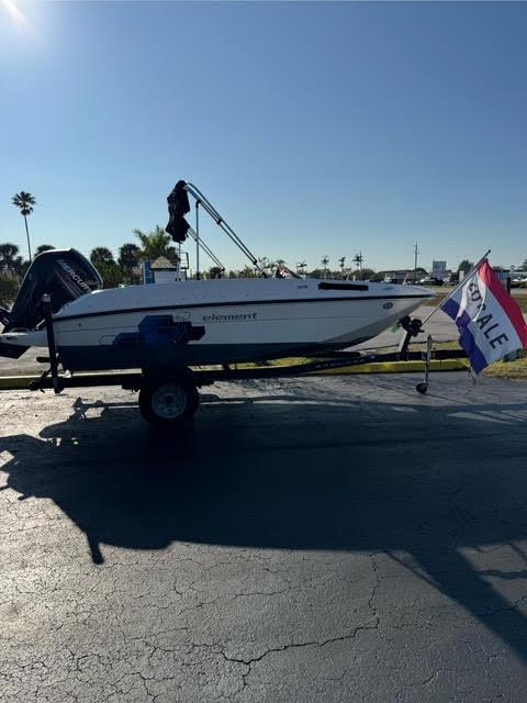 Bayliner Element 2018 Bayliner Element boat on trailer with "For Sale" sign.