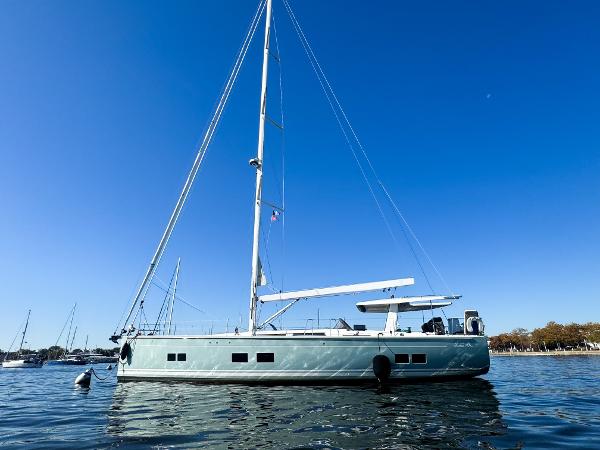 Hanse 588 2019 Hanse 588 yacht on calm water under clear blue sky.