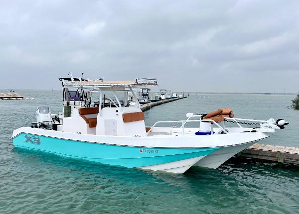 Shallow Sport Lattitude 27 2008 Shallow Sport Lattitude 27 boat docked on a calm, cloudy day.