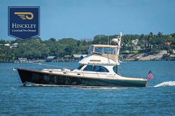 Hinckley Talaria 44 FB 2008 Hinckley Talaria 44 FB yacht cruising on a sunny day, certified pre-owned.