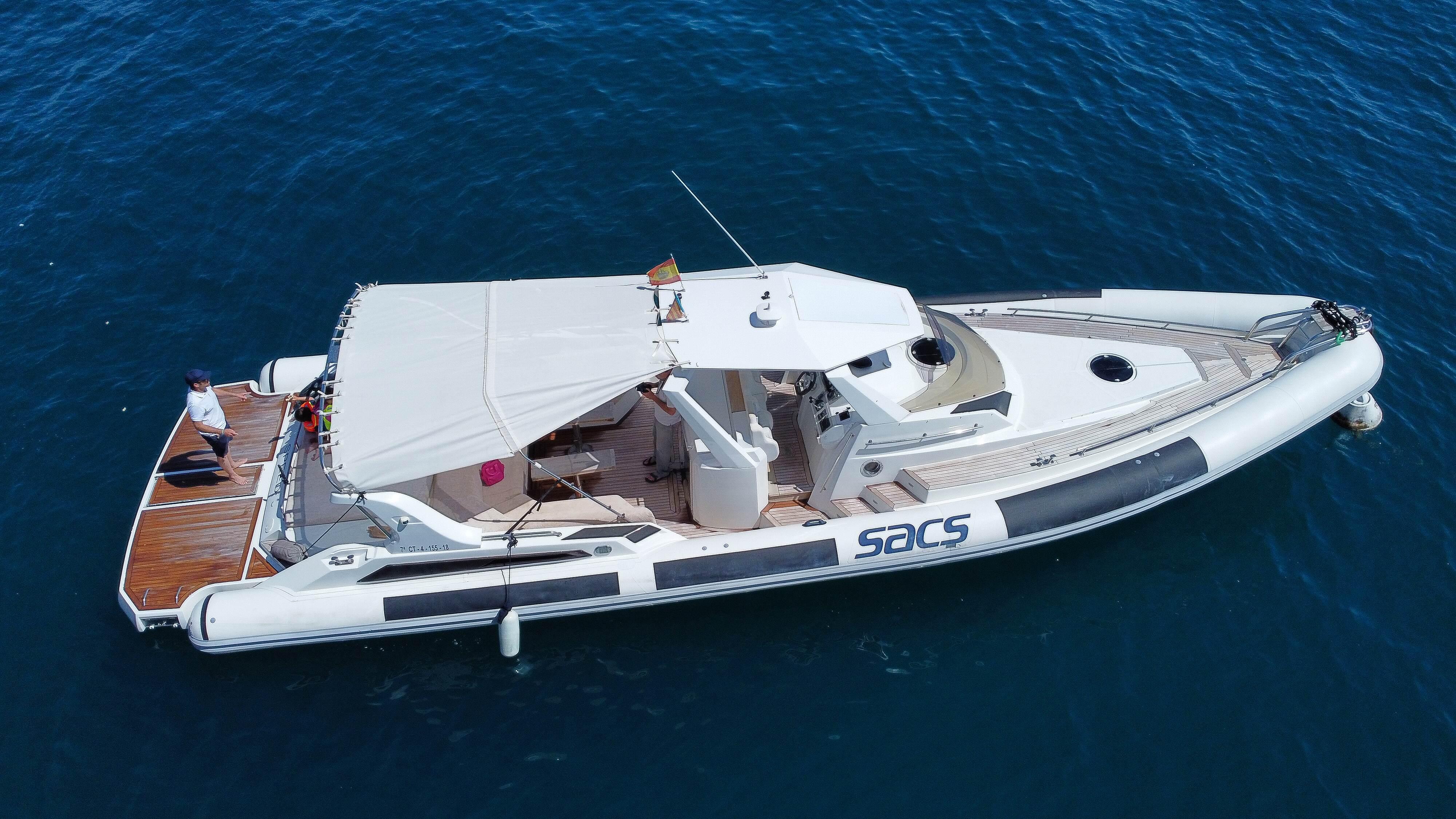 SACS 45 Strider SACS 45 Strider 2010 yacht on blue ocean water, featuring a canopy and deck.