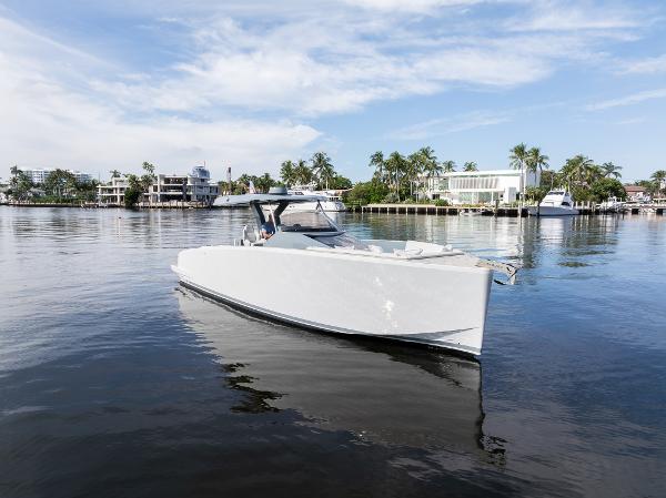 Tesoro T38 Cruiser 2022 Tesoro T38 Cruiser on calm water with palm trees in the background.