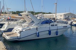 Sealine S28 2004 Sealine S28 yacht docked at marina, side view.