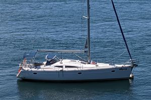 Elan Impression 434 2007 Elan Impression 434 sailboat on calm blue water.