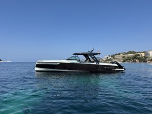 Saxdor 320 GTO 2022 Saxdor 320 GTO boat on calm blue sea, clear sky background.