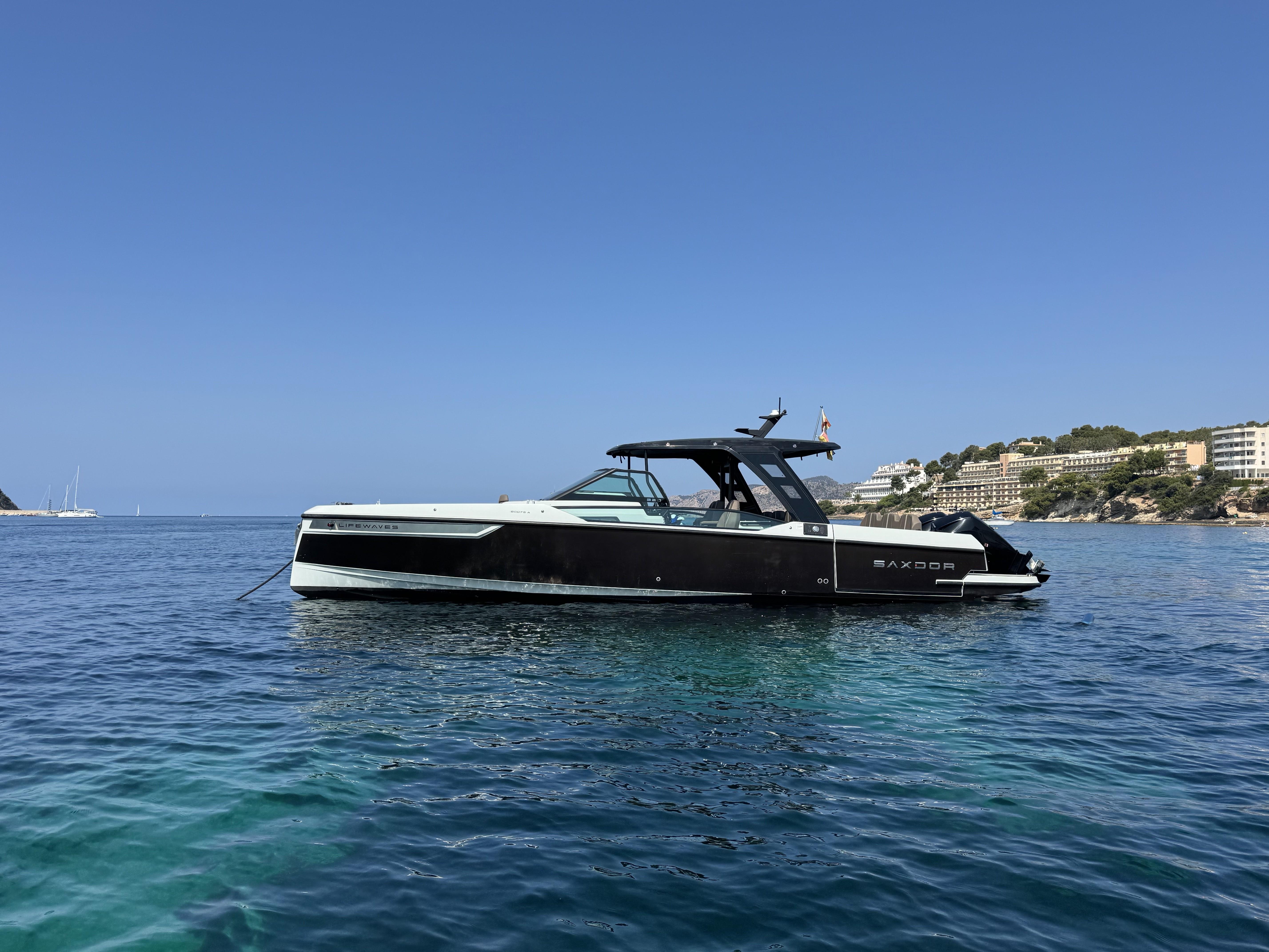 Saxdor 320 GTO 2022 Saxdor 320 GTO boat on calm blue sea, clear sky background.