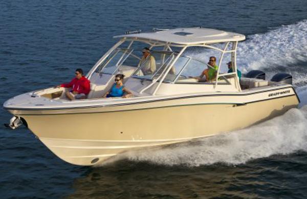 Grady-White Freedom 335 Manufacturer Provided Image: 2014 Grady-White Freedom 335 boat cruising with passengers on open water.