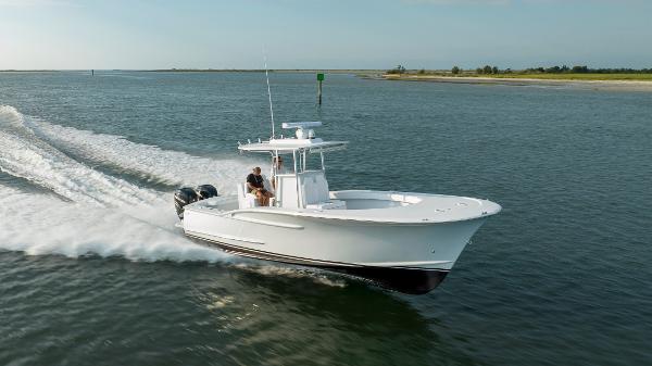 Custom Carolina 33 Willis 2019 Willis 33 Center Console boat cruising on open water.