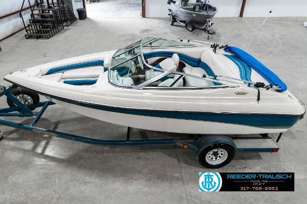 Crownline 182 BR 1995 Crownline 182 BR boat on trailer in indoor storage facility.