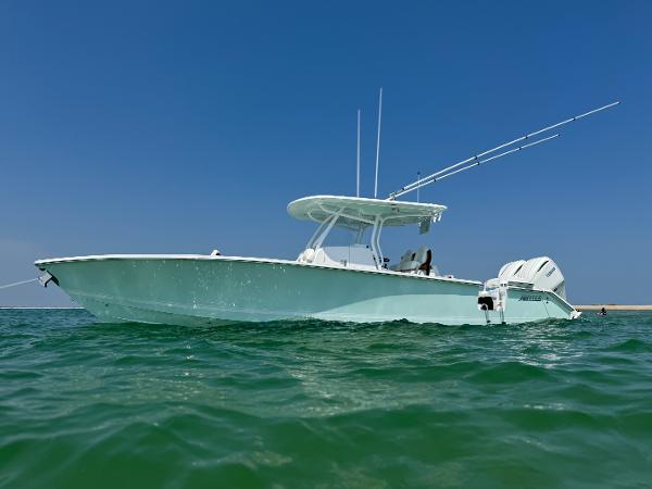 Jupiter 32 2025 Jupiter 32 boat on calm sea under clear blue sky.