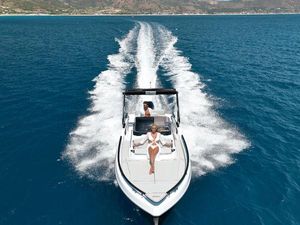 Ranieri International NEXT series 2025 Ranieri International NEXT series boat cruising on clear blue ocean waters.