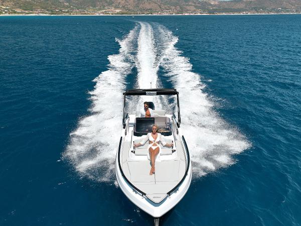 Ranieri International NEXT series 2025 Ranieri International NEXT series boat cruising on clear blue ocean waters.