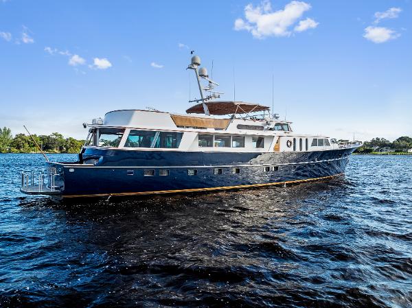 Burger 310C Classic 1973 Burger 310C yacht on water under clear blue sky.