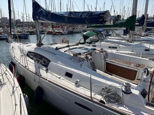Beneteau Oceanis 43 2010 Beneteau Oceanis 43 sailboat docked in a marina, surrounded by other boats.