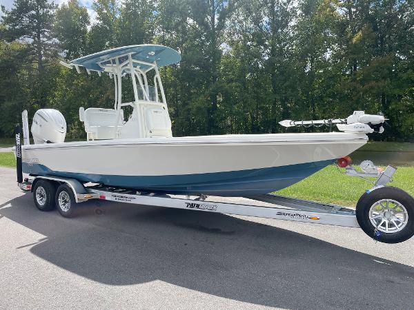 Pathfinder 2500 Hybrid 2025 Pathfinder 2500 Hybrid boat on trailer, parked outdoors.