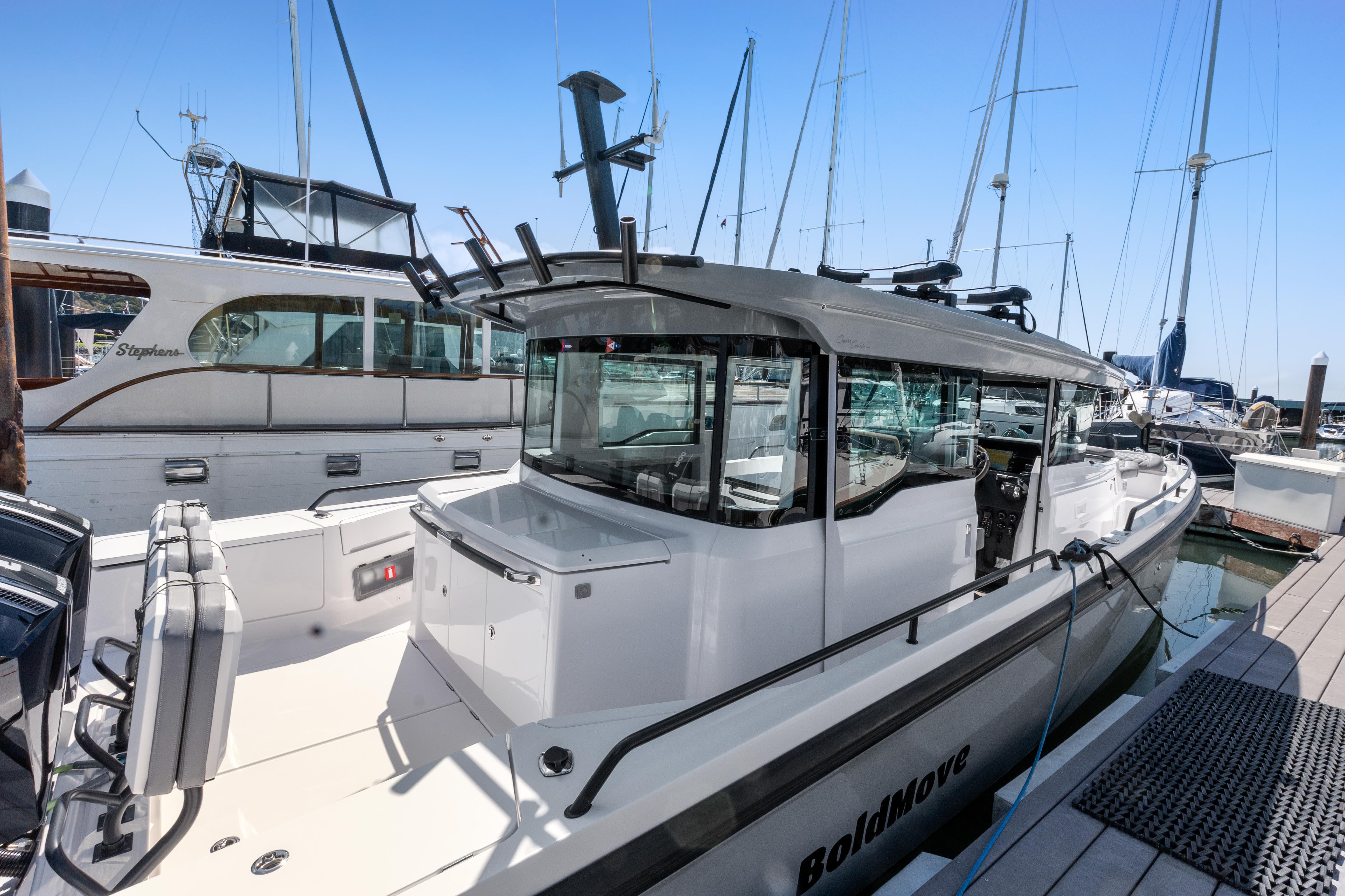Axopar 37 XC BRABUS Trim Wet Bar 2021 Axopar 37 XC BRABUS Trim Wet Bar docked at marina, showcasing sleek design.