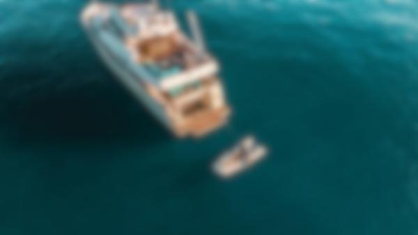 Custom Line Navetta 26 Aerial view of Custom Line Navetta 26 yacht on the ocean, 2013 model.