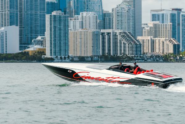 Cigarette 515 Cigarette 515 speedboat cruising near city skyline, 2022 model.