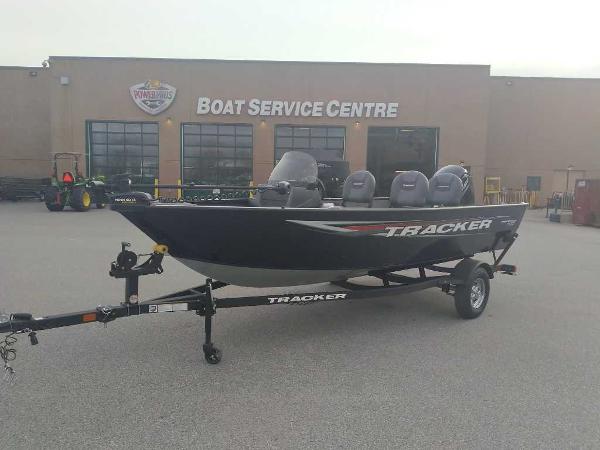 Tracker Pro Guide V-16 SC 2025 Tracker Pro Guide V-16 SC boat on trailer at service center.