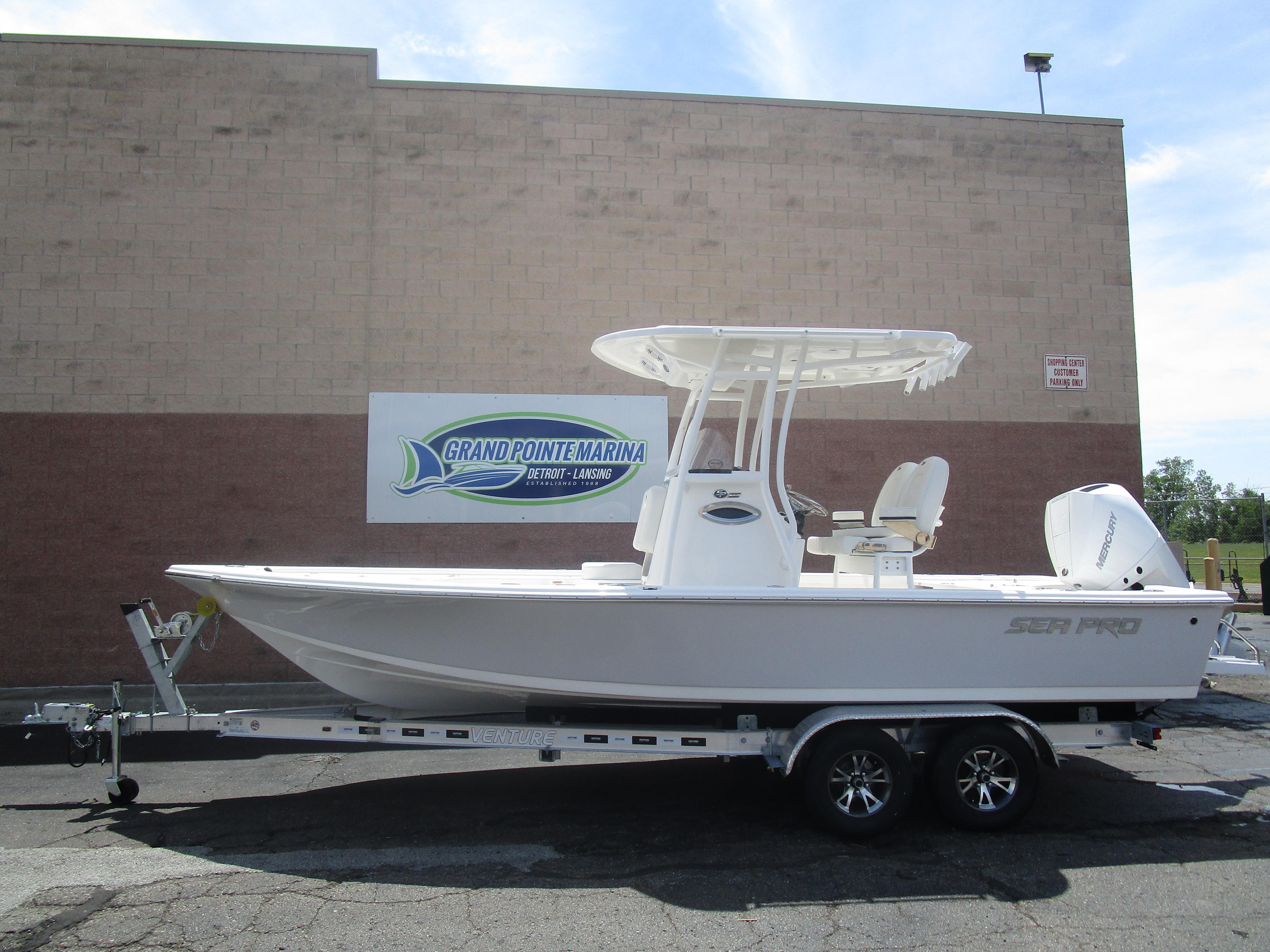 Sea Pro 230 DLX BAY 2025 Sea Pro 230 DLX BAY boat on trailer at Grand Pointe Marina.