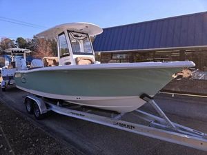 Sea Hunt Ultra 255 SE 2025 Sea Hunt Ultra 255 SE boat on trailer, parked outdoors.