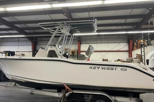 Key West 239 FS 2020 Key West 239 FS boat on trailer in indoor storage facility.