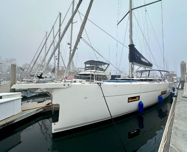Bavaria C50 2020 Bavaria C50 yacht docked at marina on a foggy day.